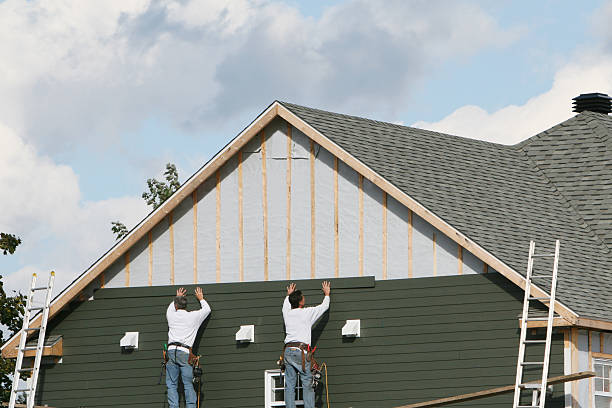 Professional Siding Replacement technician working in East Waterford, PA
